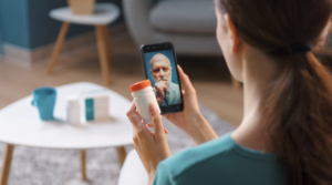 telehealth call on smartphone with doctor and patient